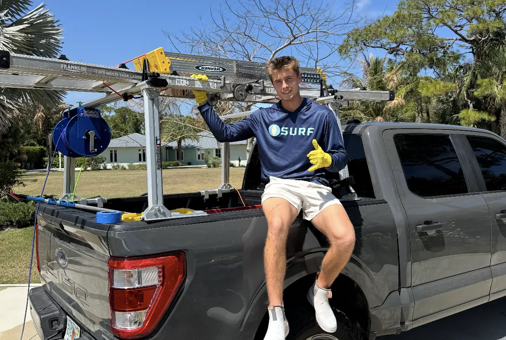Surf technician with the company truck