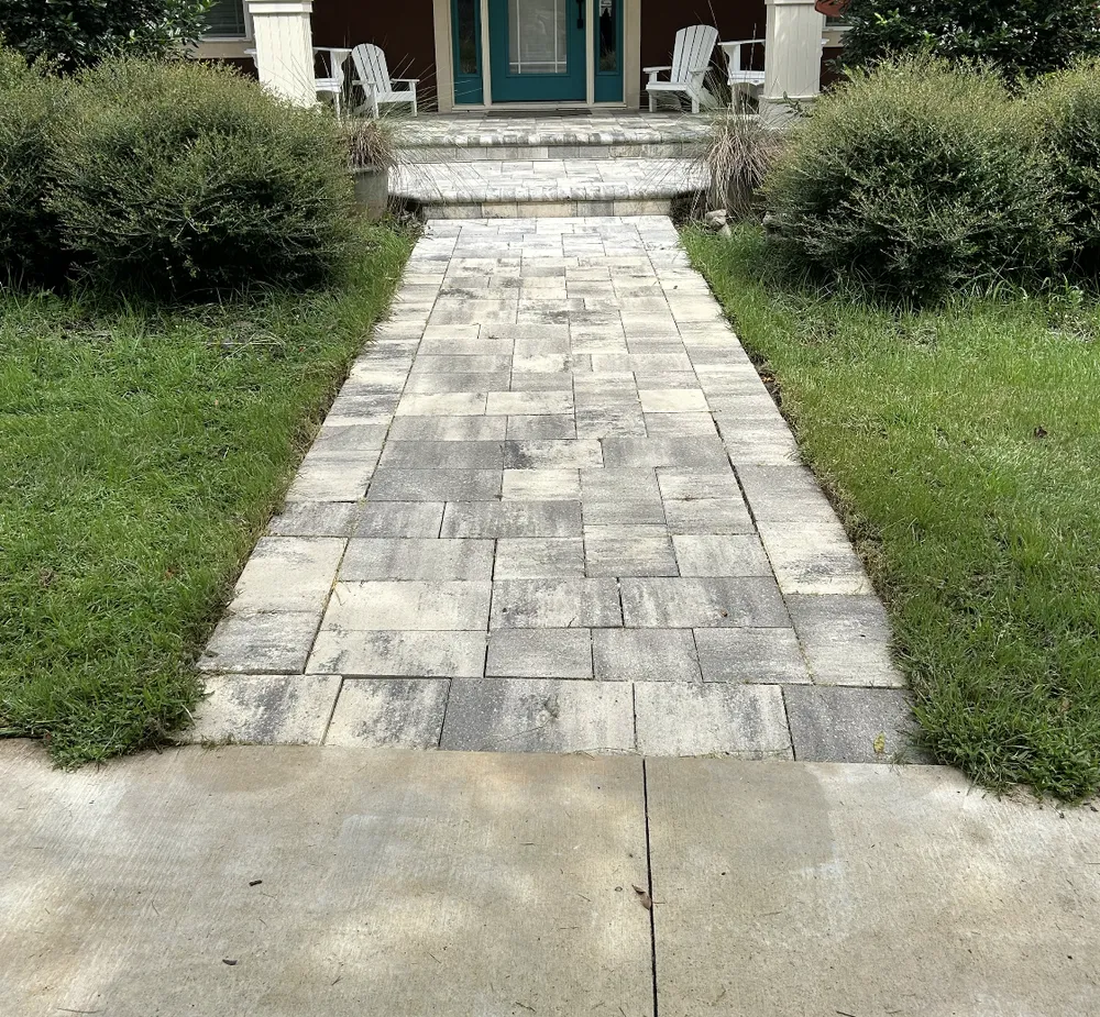 Freshly pressure-washed paver walkway